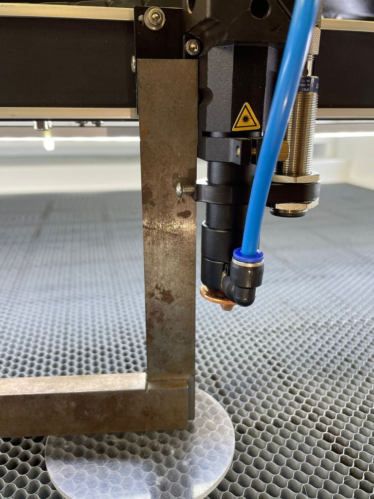 Right-angle square tool next to head