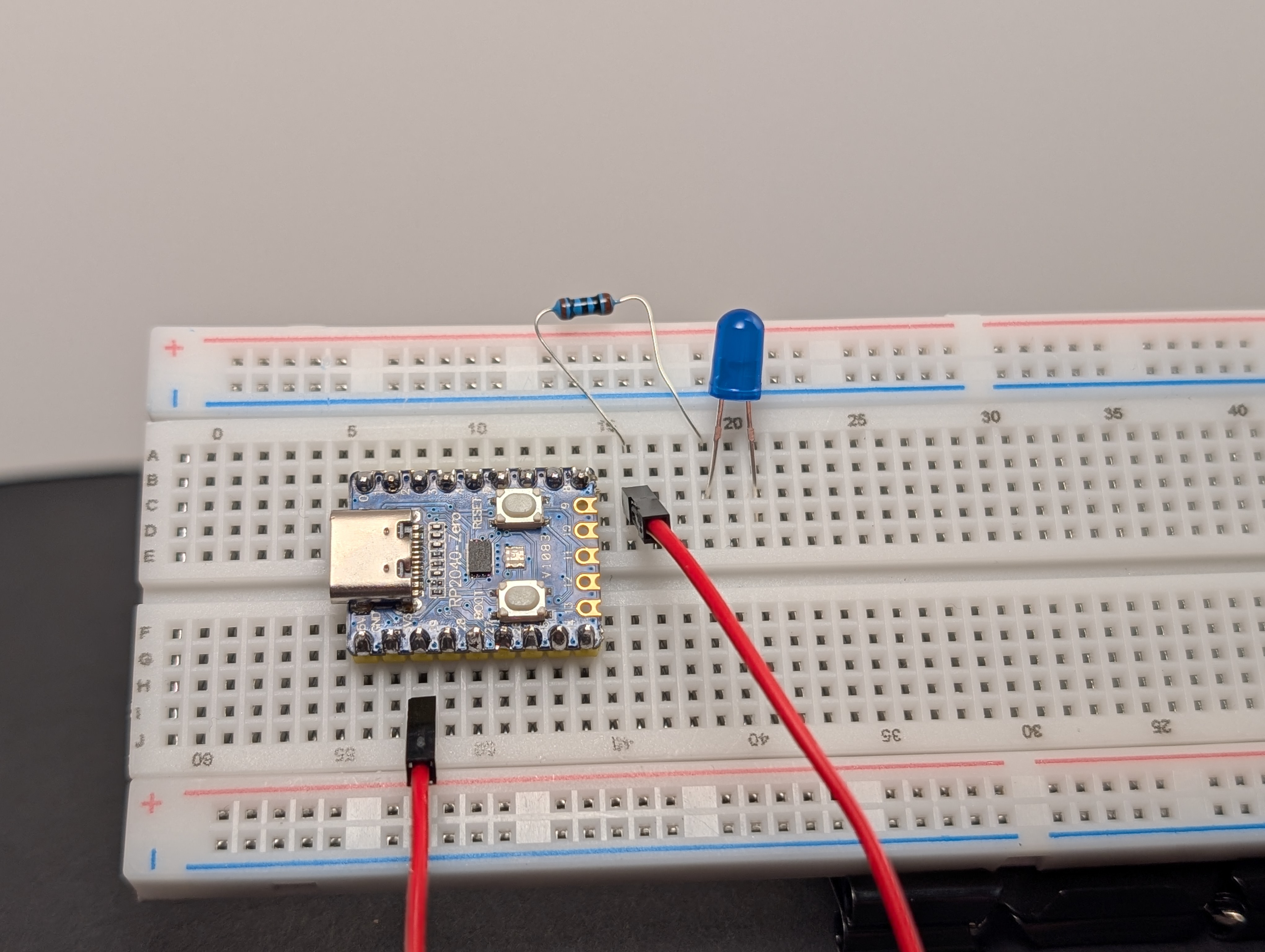 Using a jumper wire, connect the resistor side to 3V3.