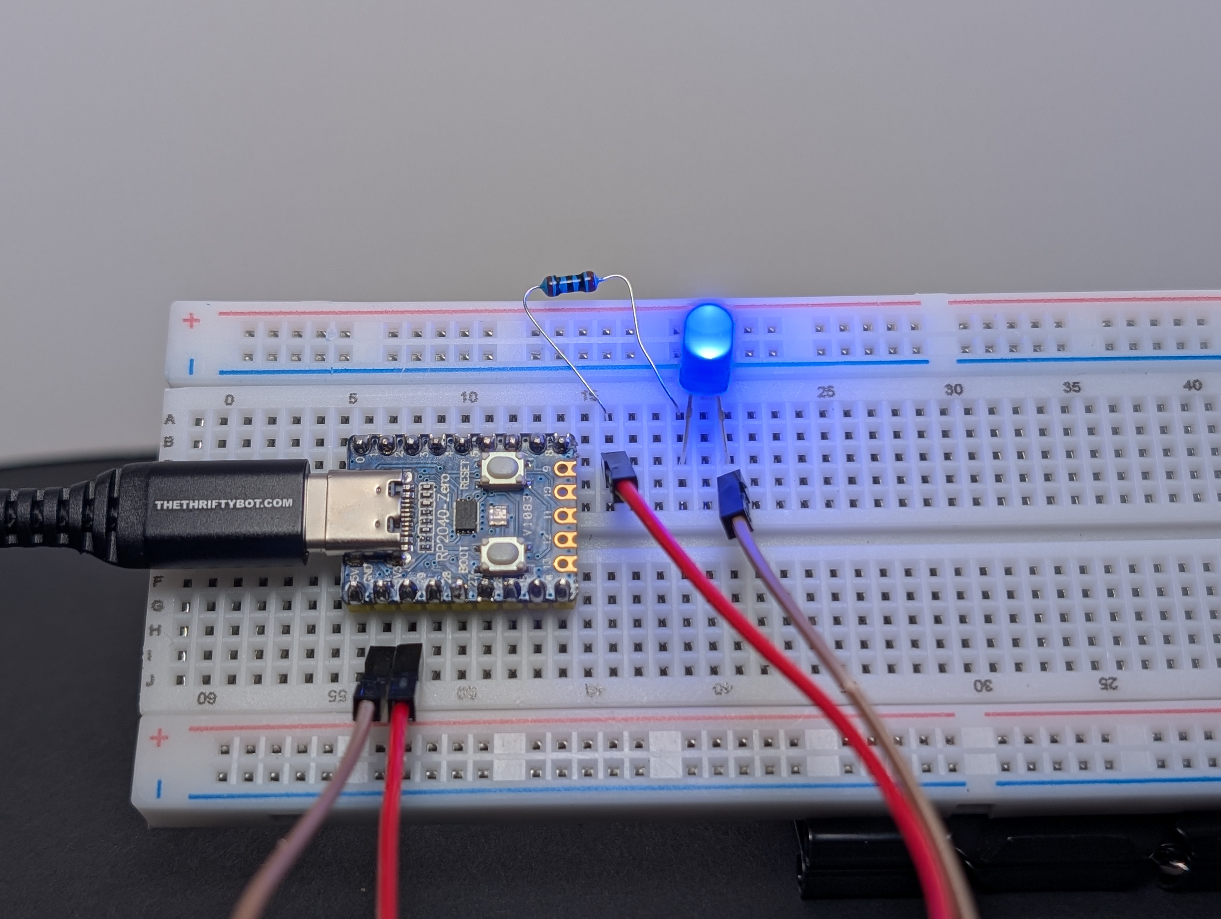 Plug the board into USB.