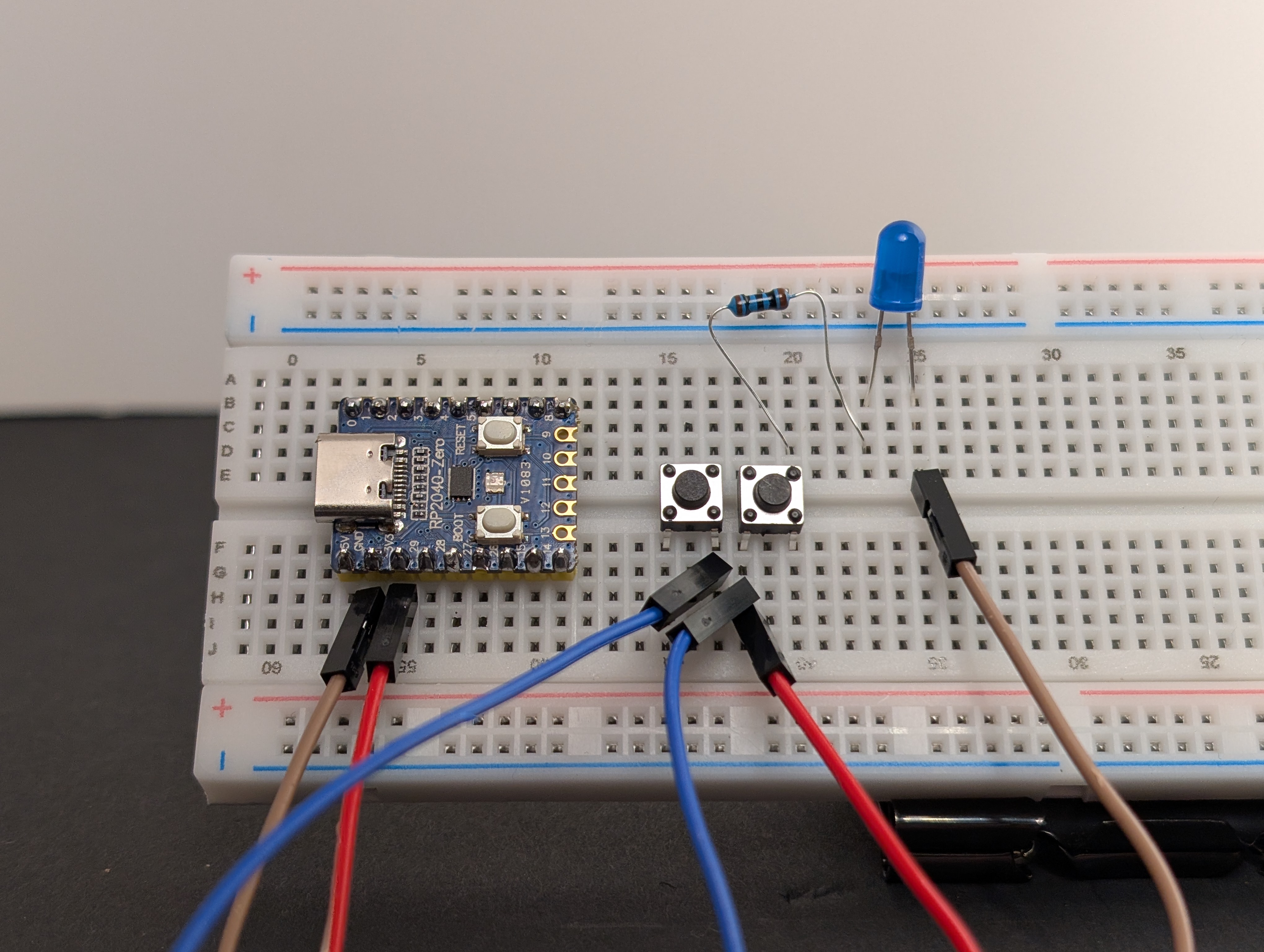 Using a jumper wire, connect one side of both buttons to 3V3.