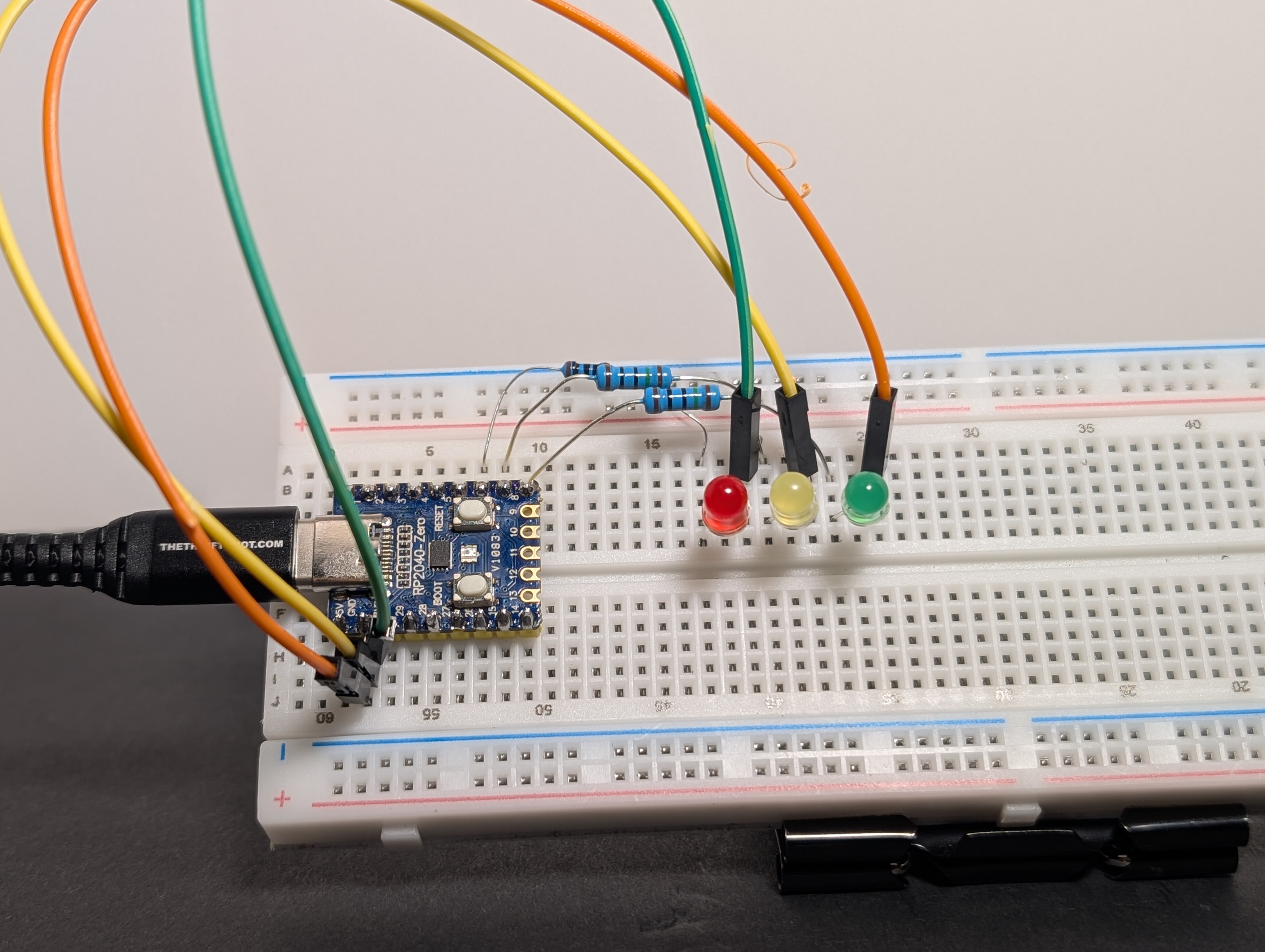 Wiring diagram showing three LEDs connected to GP6 (GPIO 6), GP7 (GPIO 7), and GP8 (GPIO 8) through separate resistors, all returning to GND