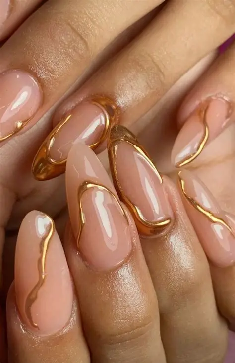 Golden Swirl Almond Nail Ideas 