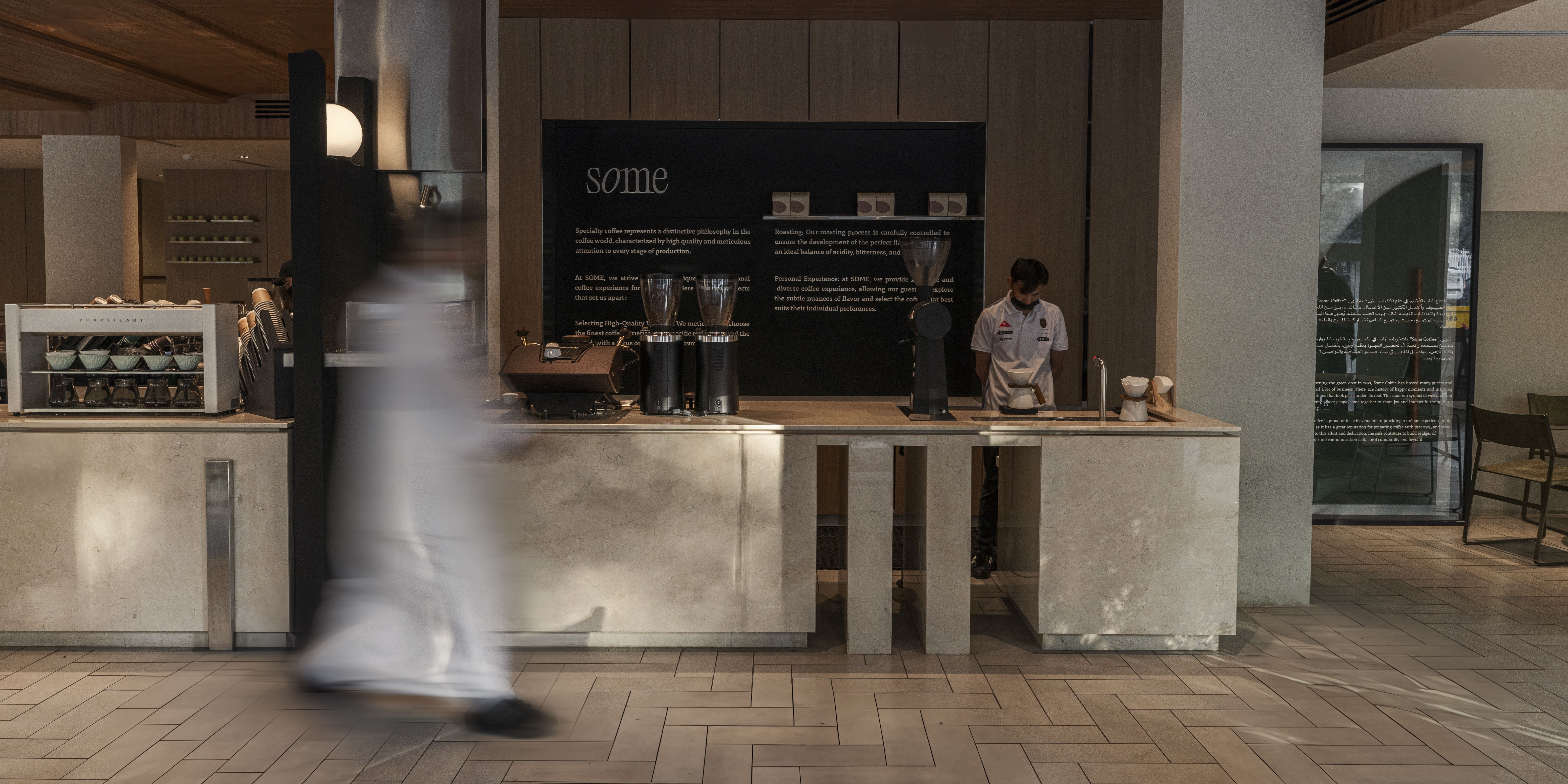 Barista preparing pour-over coffee
