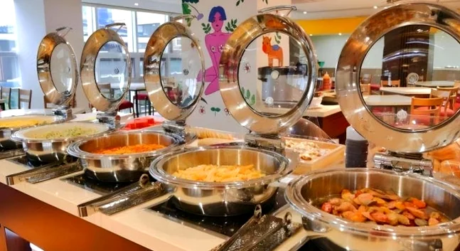 A sophisticated presentation of hot international and Korean dishes at the hotel breakfast buffet - A Curated Stay in Seogwipo: The Unrivaled Value of The First 70 Hotel