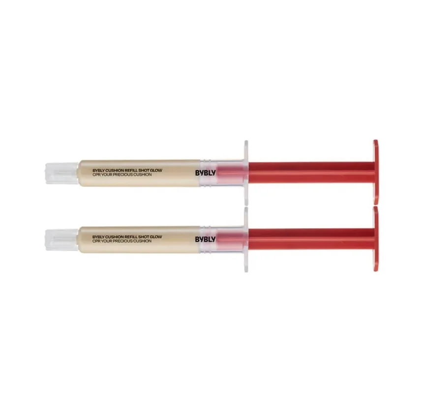 Macro detail of the BYBLY syringes featuring red-accented industrial branding. - BYBLY: The 2026 Aesthetic of Modular Beauty and the Moon Cushion Revolution