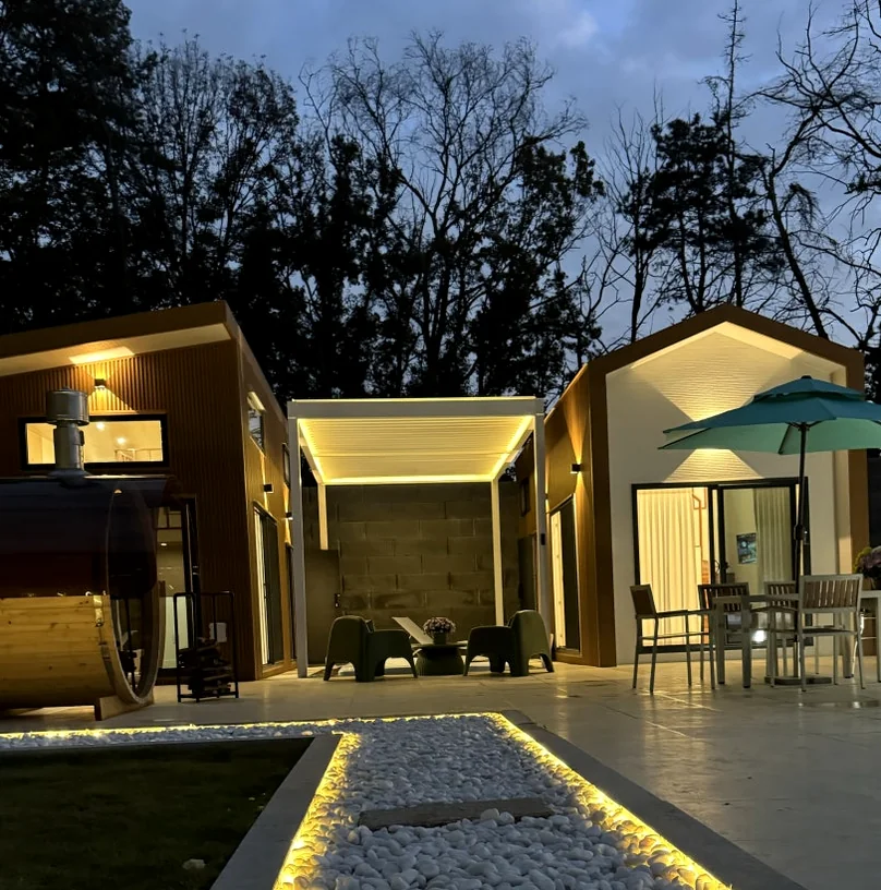 The accommodation site at dusk, highlighting the illuminated white stone paths and the clean architectural lines. - The Vertical Elegance of 죽녹원: A 2026 Masterclass in Bamboo Minimalist Living