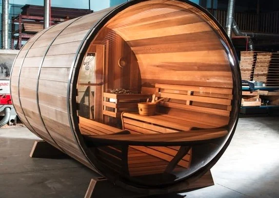 Interior view of the wooden barrel sauna showing the clean craftsmanship and aromatic cedar wood panels. - The Vertical Elegance of 죽녹원: A 2026 Masterclass in Bamboo Minimalist Living