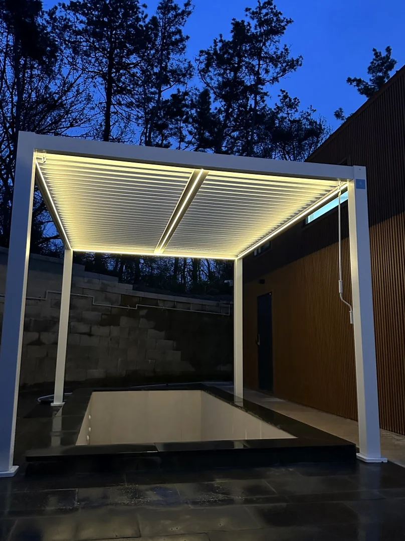 A modern pergola with integrated lighting over an outdoor pool area, demonstrating premium lifestyle aesthetics. - The Vertical Elegance of 죽녹원: A 2026 Masterclass in Bamboo Minimalist Living