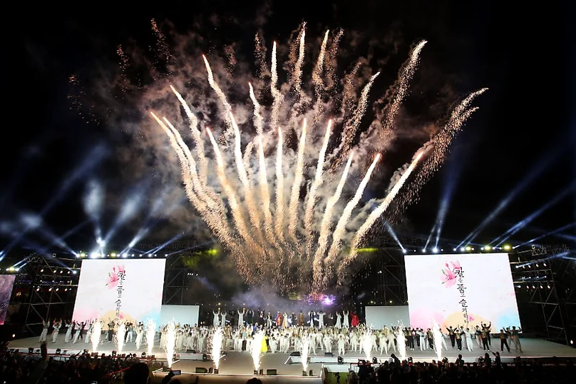 Spectacular fireworks illuminating the night sky above a stage, concluding a performance at the Miryang Arirang Festival. - The 68th Miryang Arirang Festival: A Timeless Korean Cultural Spectacle