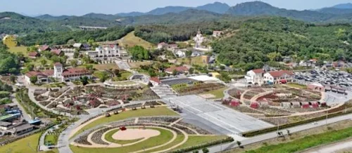 A path winding through a rose garden, inviting visitors - K-Life Hack: Imshil Cheese Theme Park's Inaugural Rose Festival in 2026