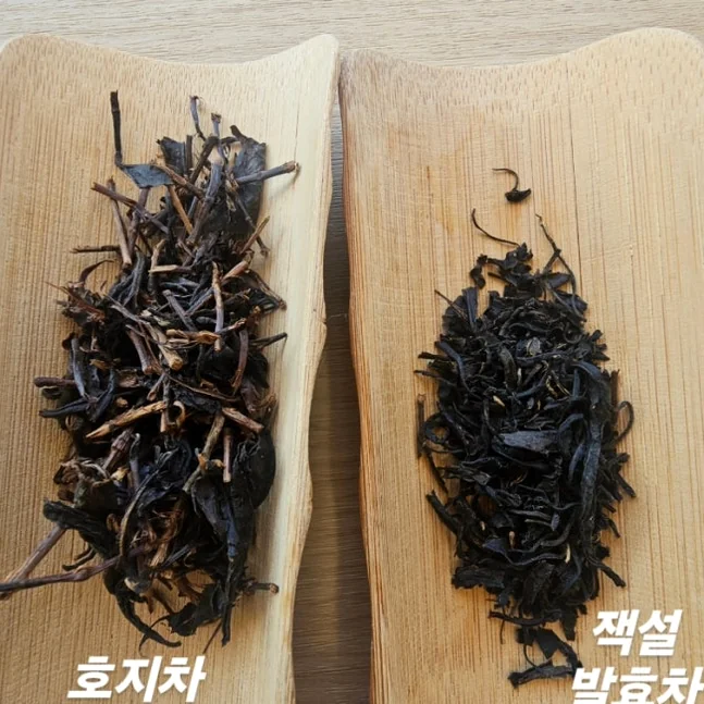 alt="地元の収穫物の有機的な質感と品質を強調する、ほうじ茶や発酵茶を含む乾燥した河東茶葉のマクロショット" - 智異山の静寂を味わう：河東（ハドン）野生茶博物館で体験する韓国最高級のお茶文化ガイド