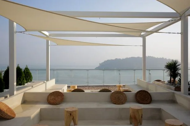 The sophisticated exterior of Badaap Terrace, showcasing its prime location with an expansive ocean backdrop under a clear sky. - Badaap Terrace: Yeongjongdo's Premier Oceanfront Cafe Experience