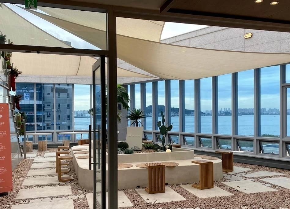 A close-up of a meticulously designed menu board or signage, highlighting the cafe's commitment to aesthetic and clear communication. - Badaap Terrace: Yeongjongdo's Premier Oceanfront Cafe Experience