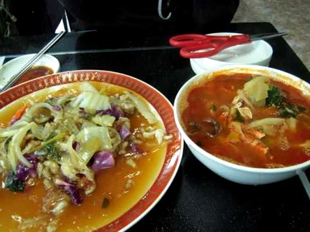 A detailed shot of the kkakdugi served at Deokseongwon, a fermented radish side dish that provides a sharp, refreshing palate cleanser. - Jeju Heritage Gastronomy: The Timeless Allure of Deokseongwon Seogwipo
