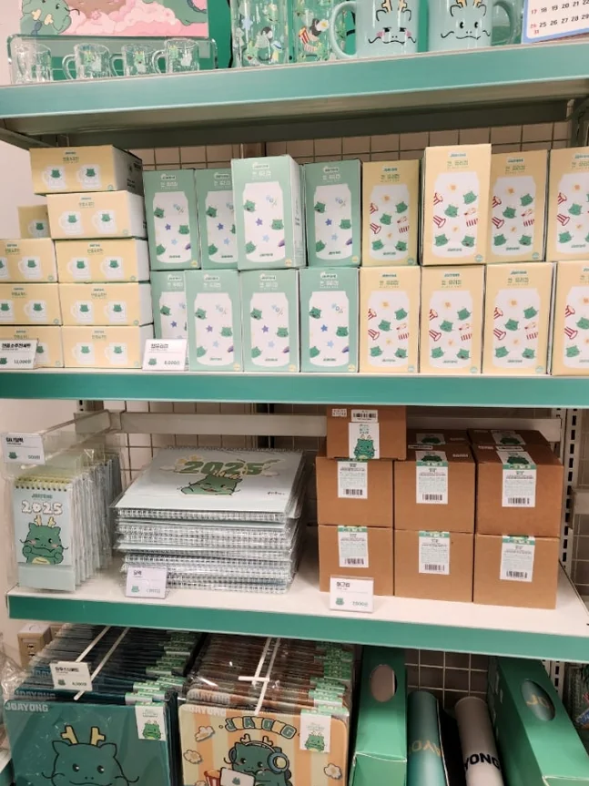 A variety of Joayong merchandise, presented in elegant boxes and packages, showcasing the thoughtful design and diverse product range available at the pop-up store. - Joayong's Popcorn Journey: E-Mart Borajum's Premier Character Pop-Up