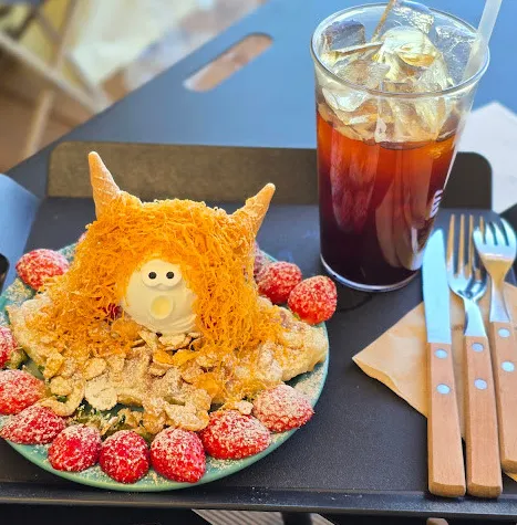 A captivating billboard displaying the iconic scene from the K-drama 'Goblin' - Jumunjin's Dokkaebi Gelato: A Curated Coastal Escape Beyond the Screen