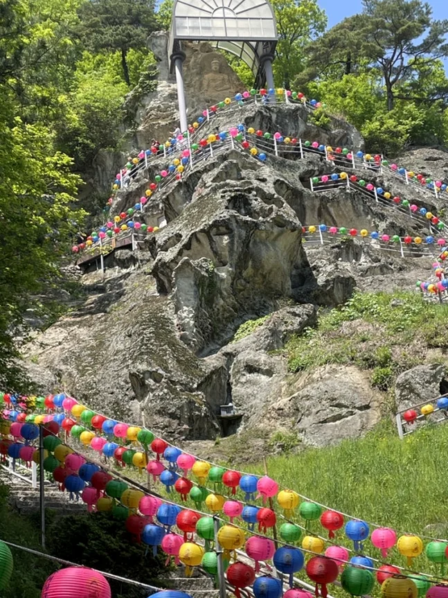 alt="A closer study of the unique limestone cliffs and hand-carved grottoes, revealing the architectural mystery of Golgulsa." - Golgulsa Temple: Ascetic Luxury in Gyeongju’s Sacred Limestone Grottoes