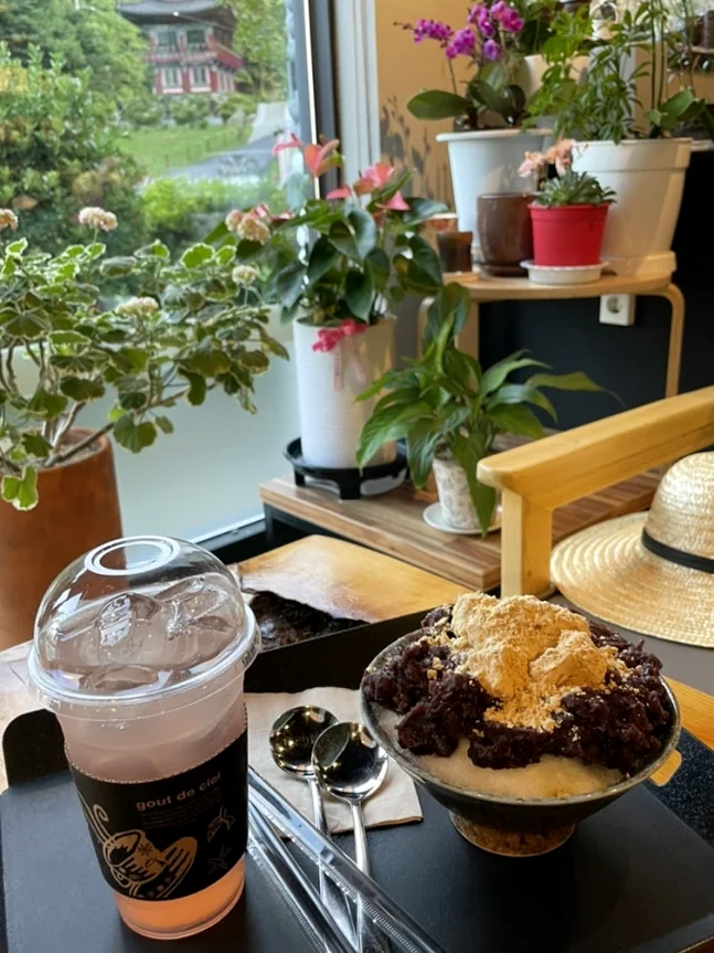 alt="A moment of refreshment at a nearby temple cafe, where traditional bingsu meets the serene view of the surrounding mountain peaks." - Golgulsa Temple: Ascetic Luxury in Gyeongju’s Sacred Limestone Grottoes