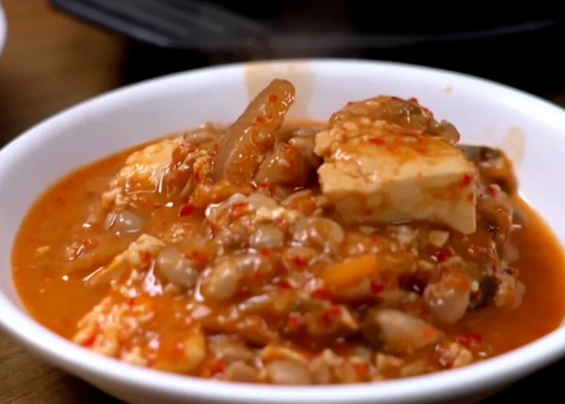 A comforting portion of signature stew, highlighting its earthy, savory depth. - Ancestral Umami: Geumseong Restaurant Yangji Yongin