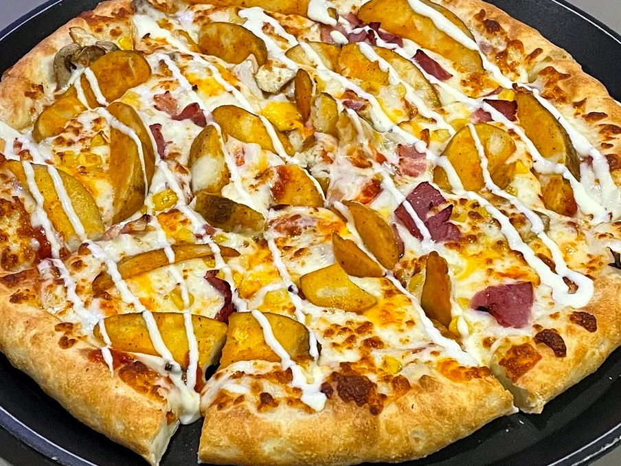 Pasta baked in a ceramic bowl with browned cheese topping - Gastronomic Icon: The Definitive Guide to Lee Jae-mo Pizza Main Store