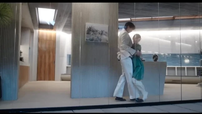 A full shot of the protagonists in a minimalist, modern interior, embracing, symbolizing the contemporary grand prince's wife's lifestyle. - 21st Century Grand Prince's Lady: A Royal Romance Redefined (K-Drama Review)