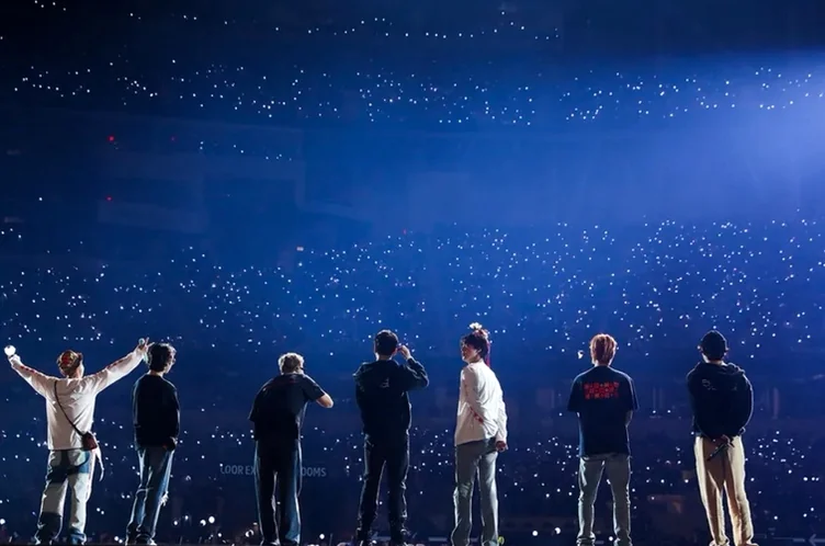 A poignant closing shot of the BTS members looking out at the vast stadium after the show - BTS Arirang World Tour: A Masterpiece of Cultural Heritage and Global Modernity