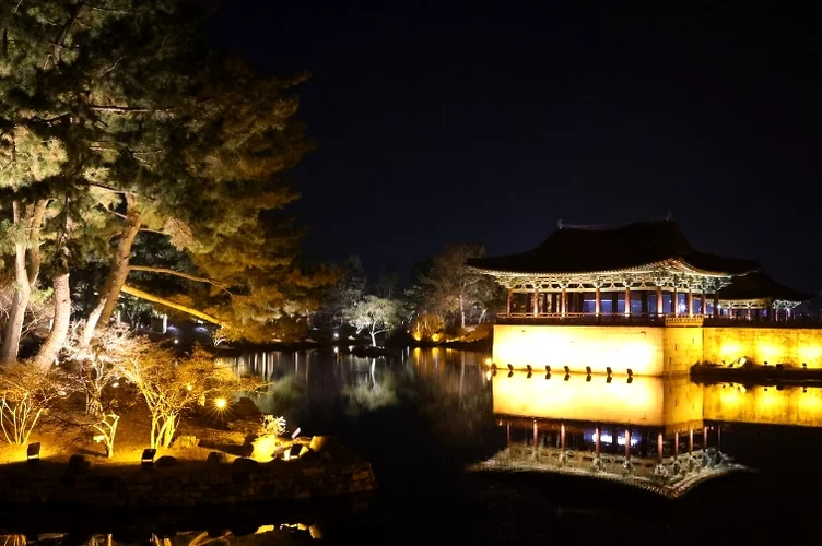 An artistic shot capturing the perfect vertical symmetry of the palace reflection in the stillness of the night - Beyond the Moonlight: The Timeless Allure of Gyeongju Donggung Palace and Wolji Pond