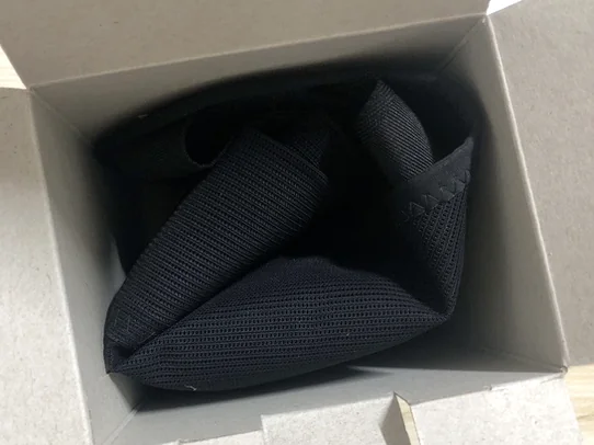 Opened box revealing the actual product color and pristine packaging condition upon unboxing - Mastering Ergonomic Comfort: A Deep Dive into the Medicaid Style Care Back Stretching Band