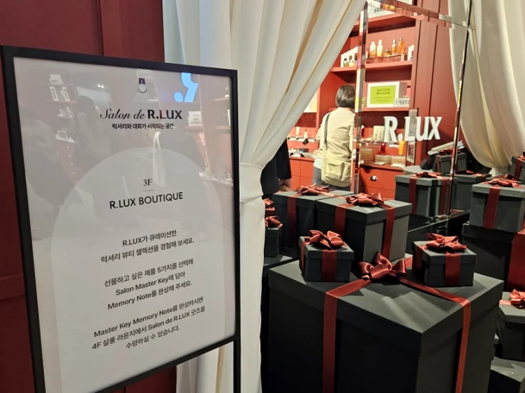 A luxury lounge interior featuring classic car elements and warm wood tones - Inside Salon de R.LUX: The Pinnacle of Seongsu-dong's Luxury Lifestyle Pop-up