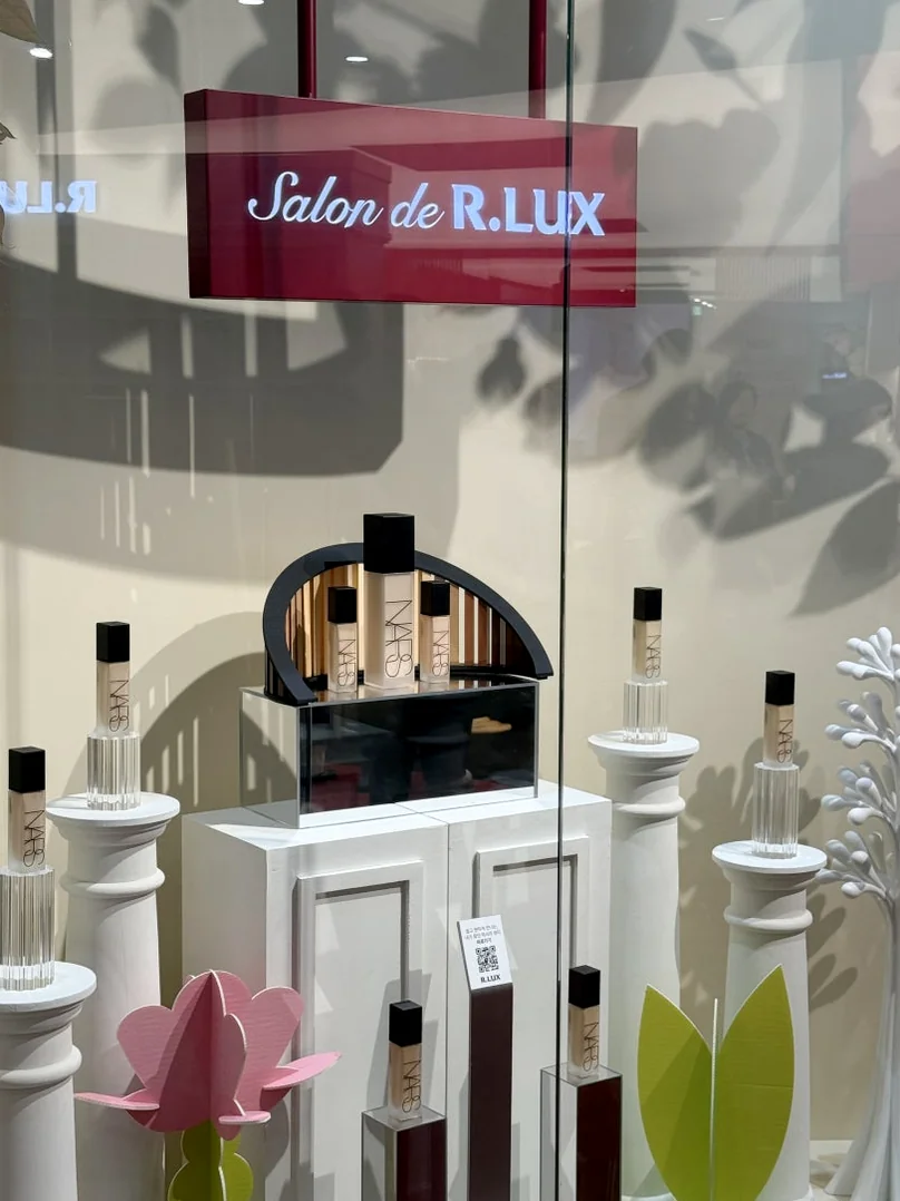 A minimalist and sleek entrance hallway emphasizing the R.LUX branding - Inside Salon de R.LUX: The Pinnacle of Seongsu-dong's Luxury Lifestyle Pop-up