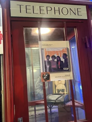 Red telephone booth used as decorative entrance with 'TELEPHONE' sign. - A Cinematic Escape in Seongsu: The Deep Vibe Guide to Kumgyol Wine & LP Bar