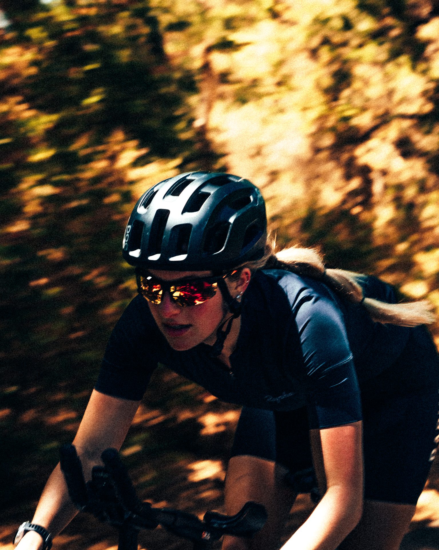 Athlete in motion — golden dappled light