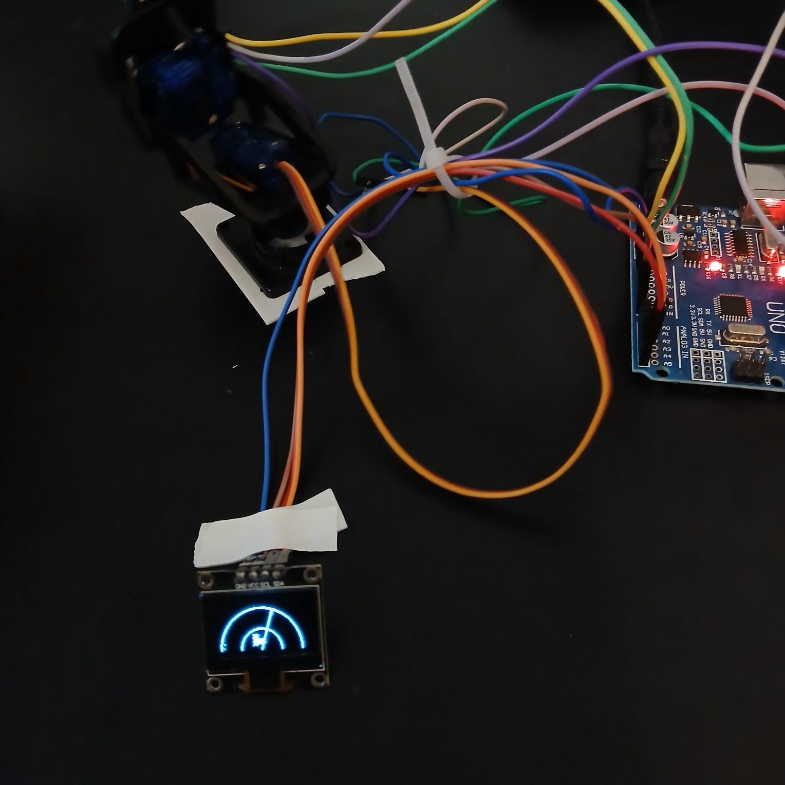 Arduino Radar Scanner พร้อม OLED Display และ Servo Sweep Visualization