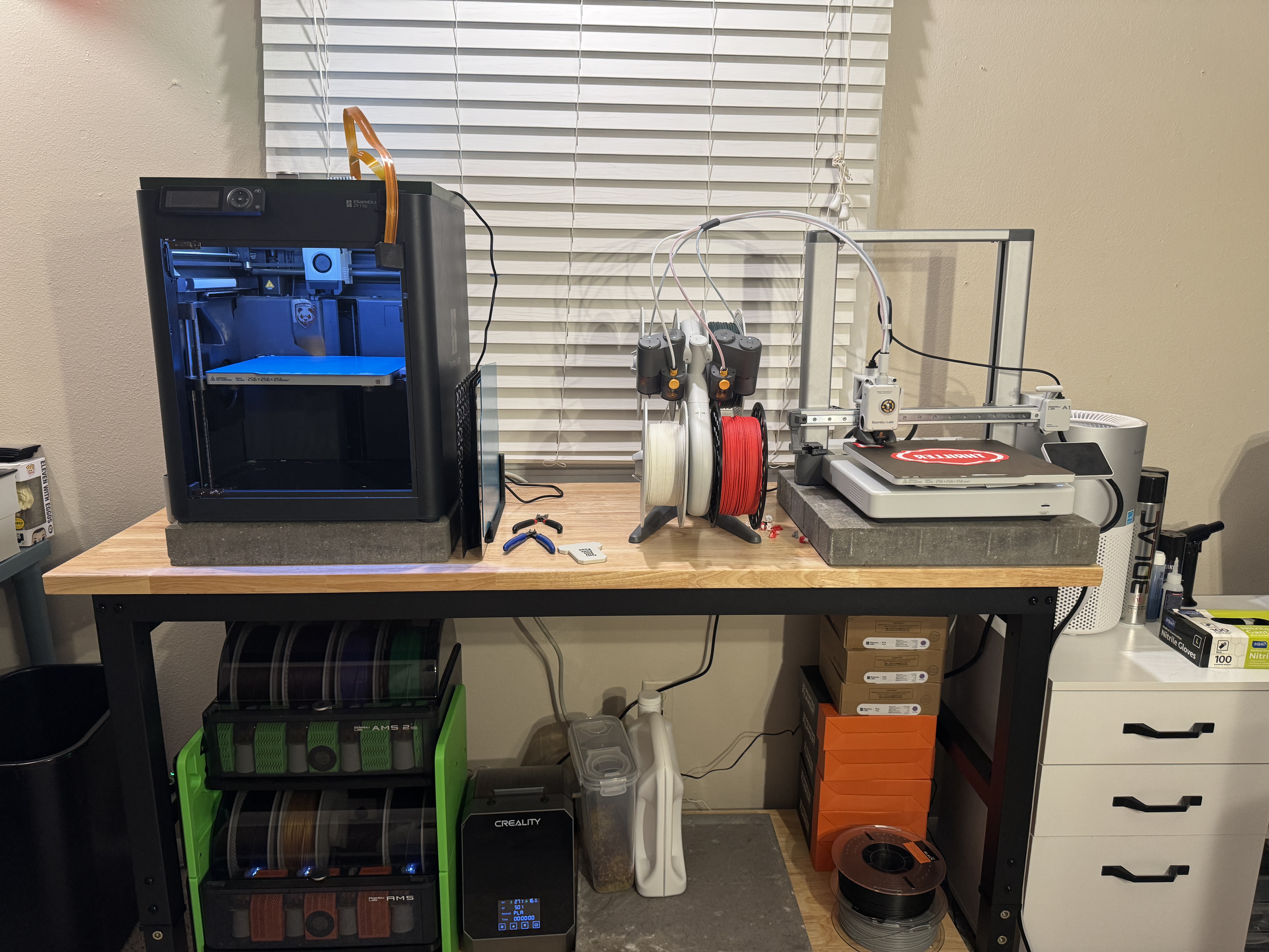 Bleak Pattern Co. print farm — two Bambu Lab printers on workbench