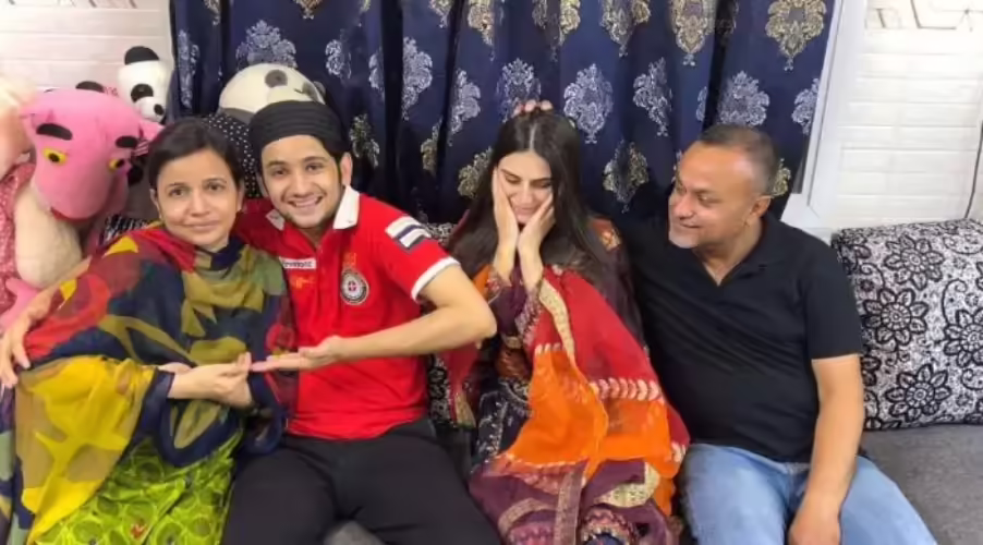 Maaz Safder with his mother and father