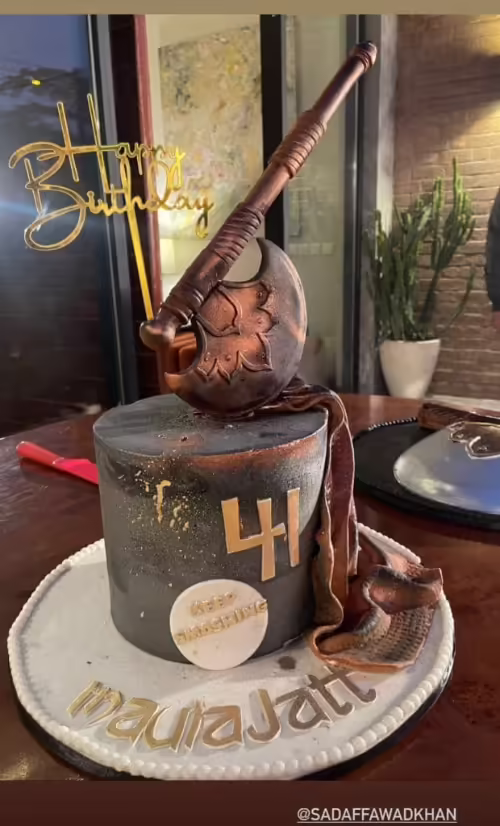 Fawad Khan cuts his 41 birthday cake with wife Sadaf Fawad