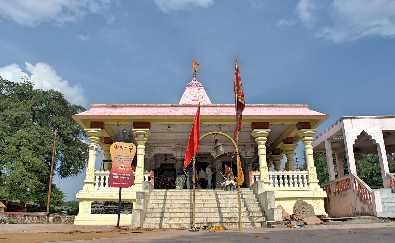 Front porch and steps of the Kal Bhairav Temple in Ujjain with saffron flags