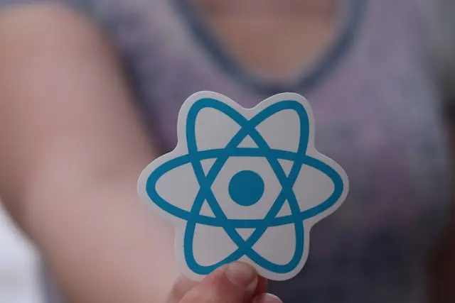 A react atom sticker with a blurred background