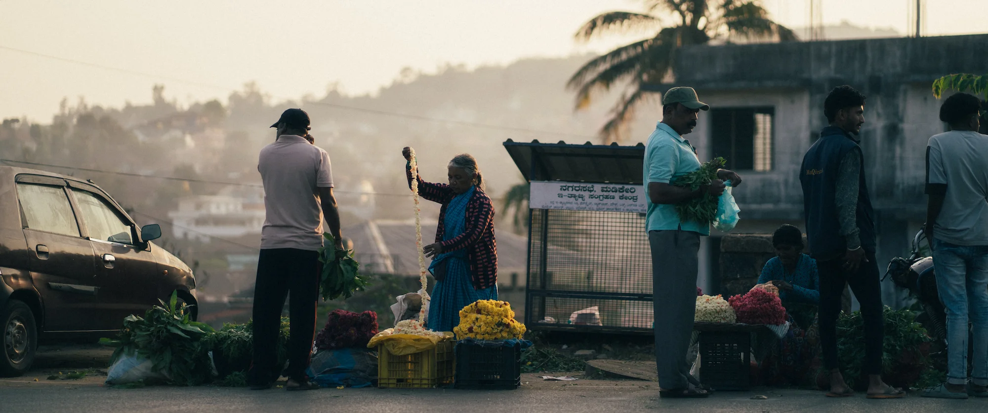 A lady selling flowers, Coorg