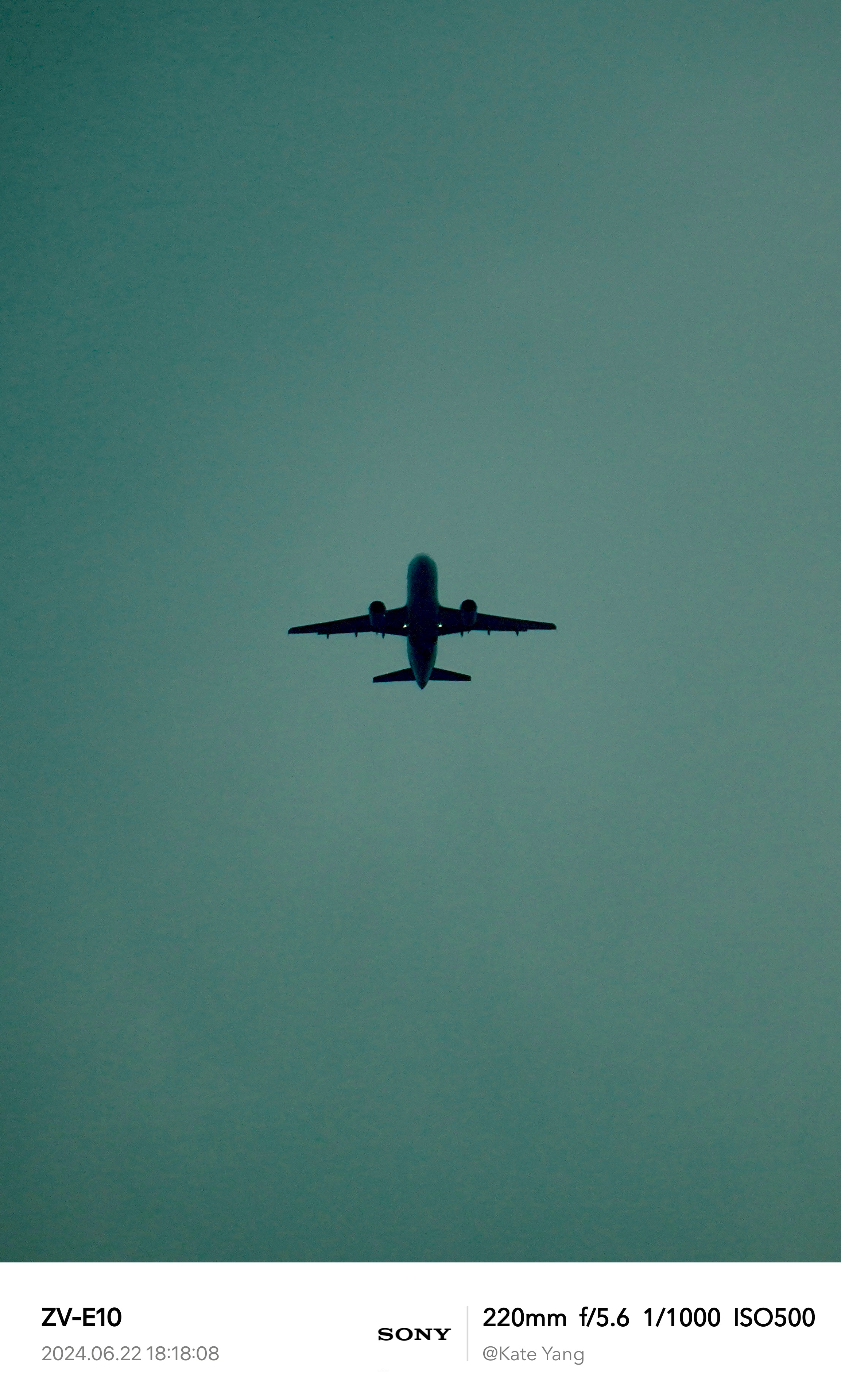 Airplane in Cloudy Sky