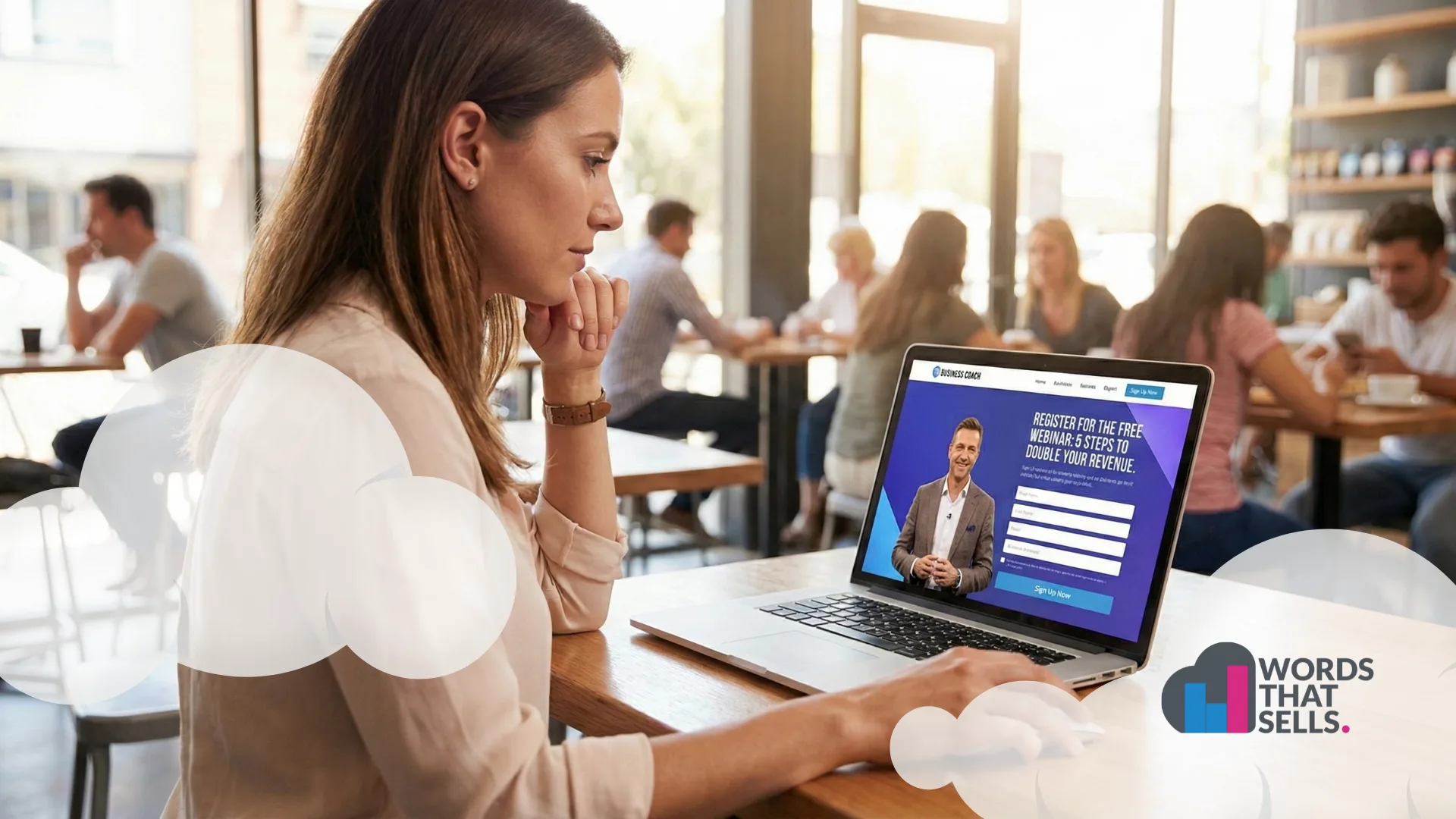 A person signing up for a webinar on a laptop