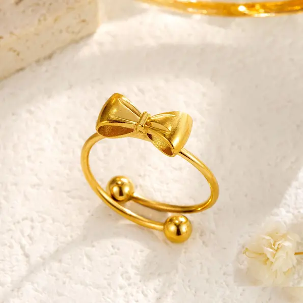 Adjustable bow tie ring 144