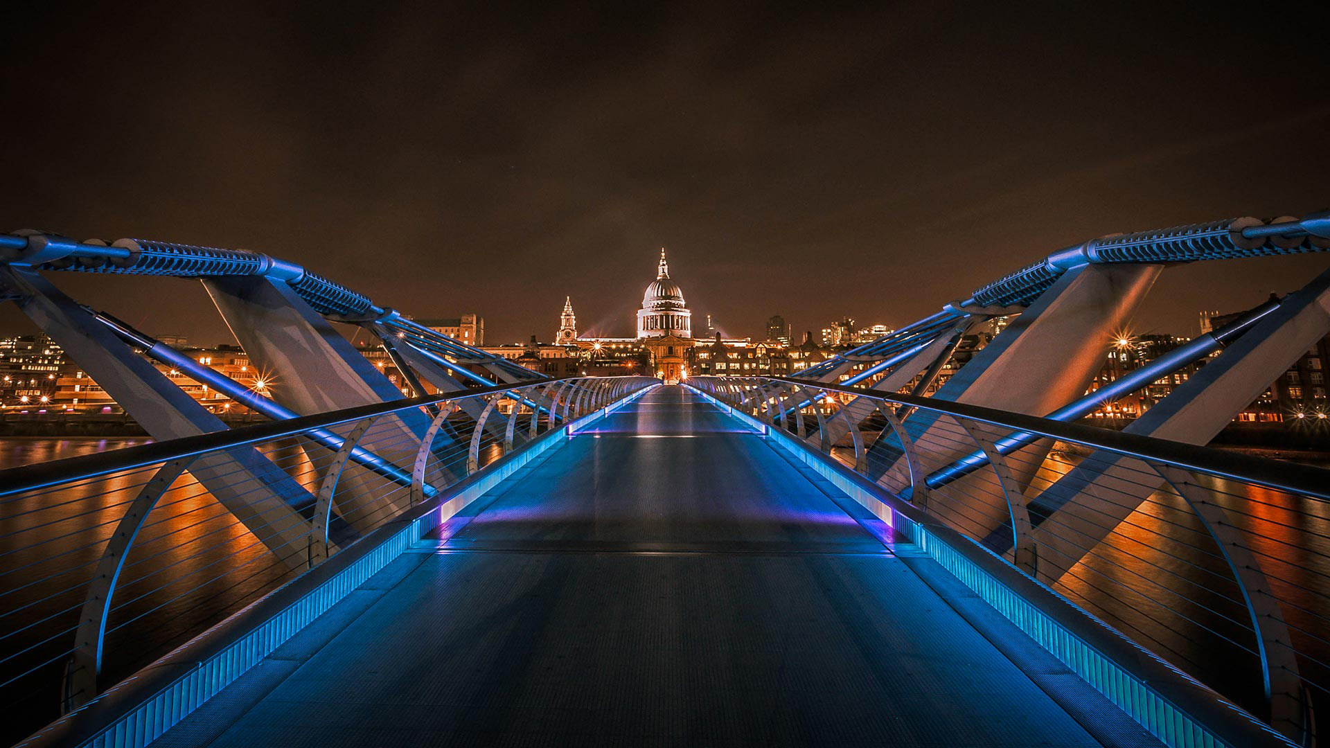 Millennium Bridge with St. Paul's Cathedral in the background, London, England - Scott Baldock/Getty Images)