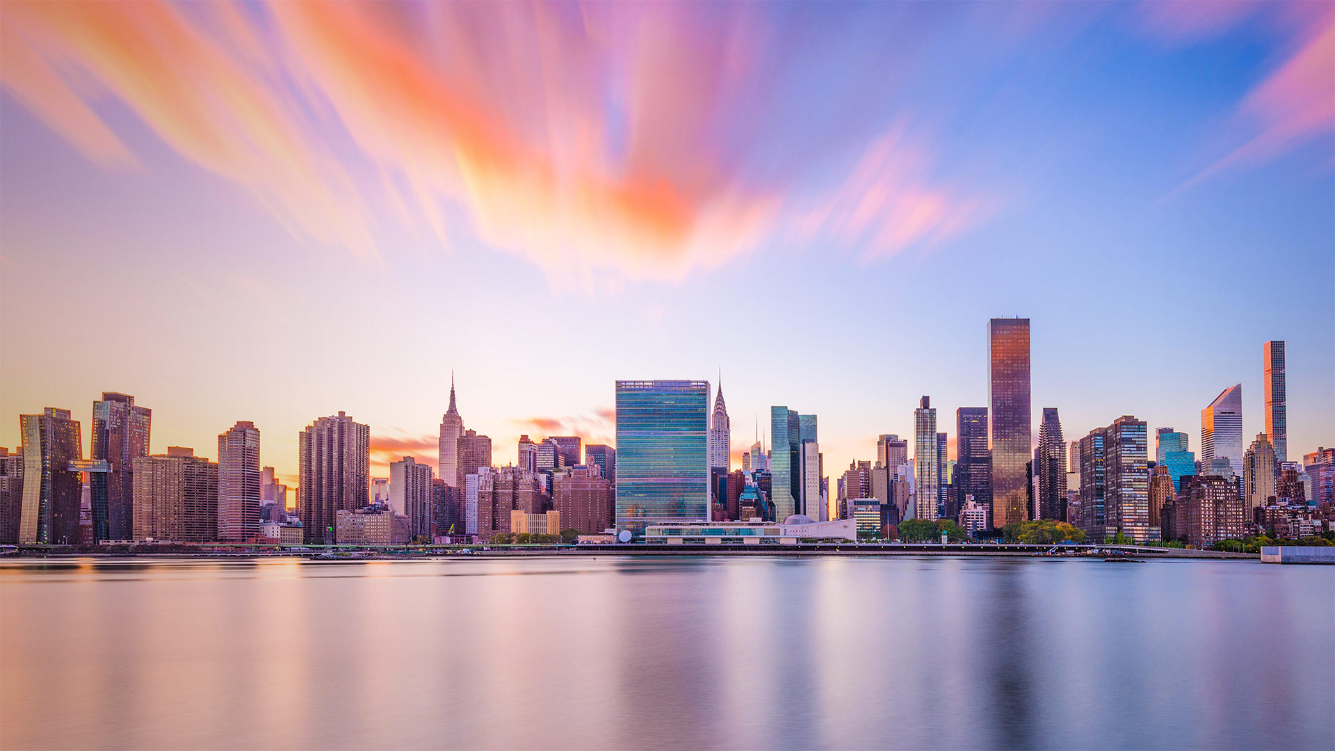 New York City skyline with United Nations headquarters - Sean Pavone/Alamy)