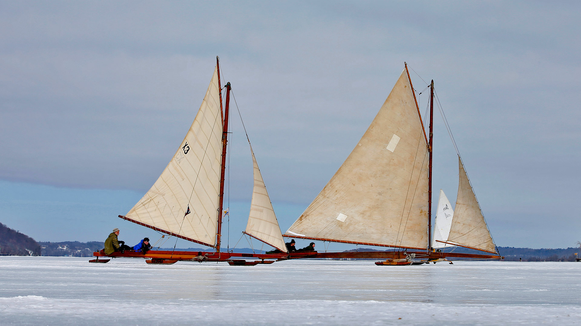 Antique iceboats on the frozen Hudson River near Astor Point in Barrytown, New York - Mike Segar/REUTERS)