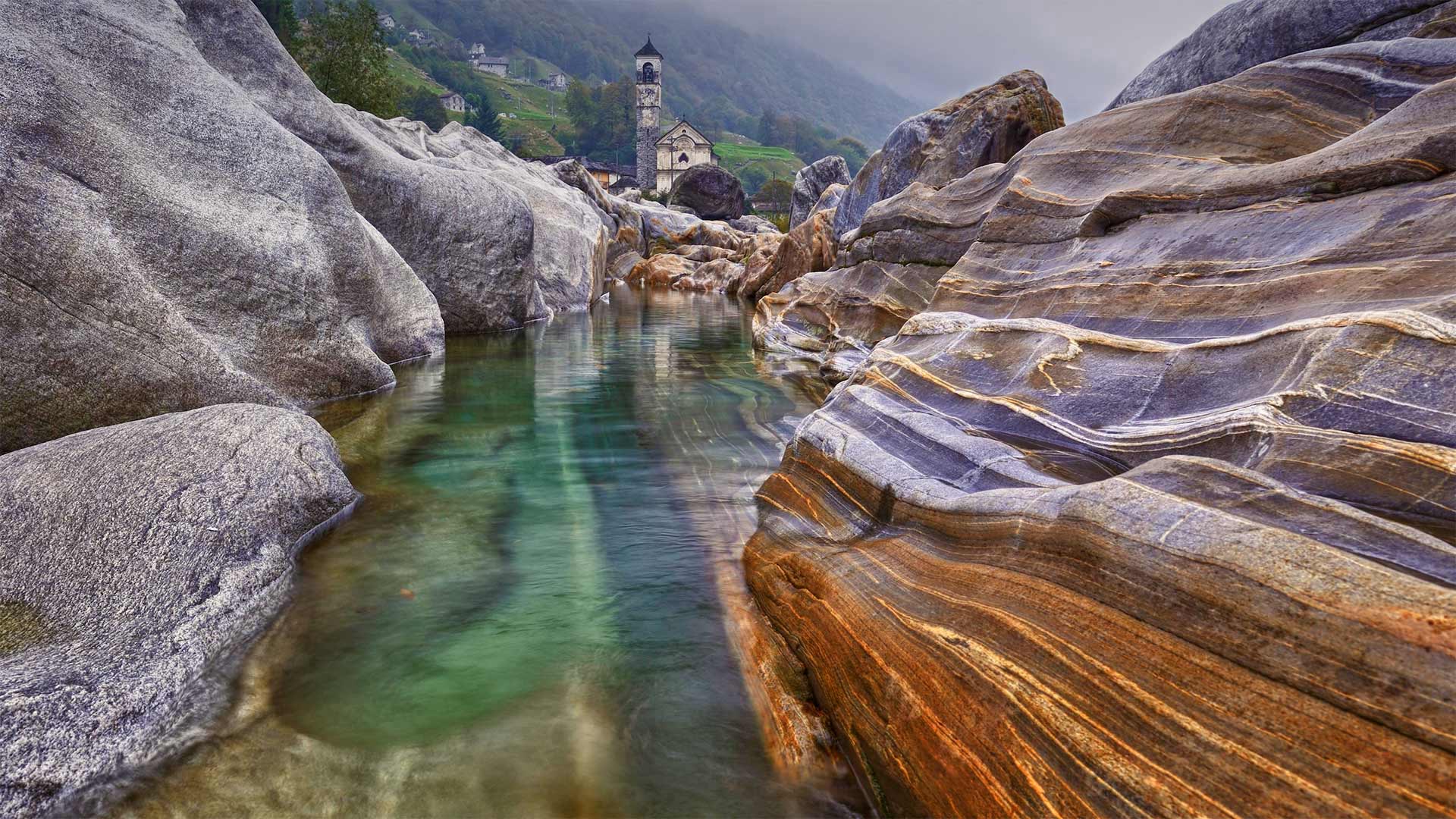 Rocks in the Verzasca River near the hamlet of Lavertezzo in the Valle Verzasca of Switzerland - Robert Seitz/Offset by Shutterstock)