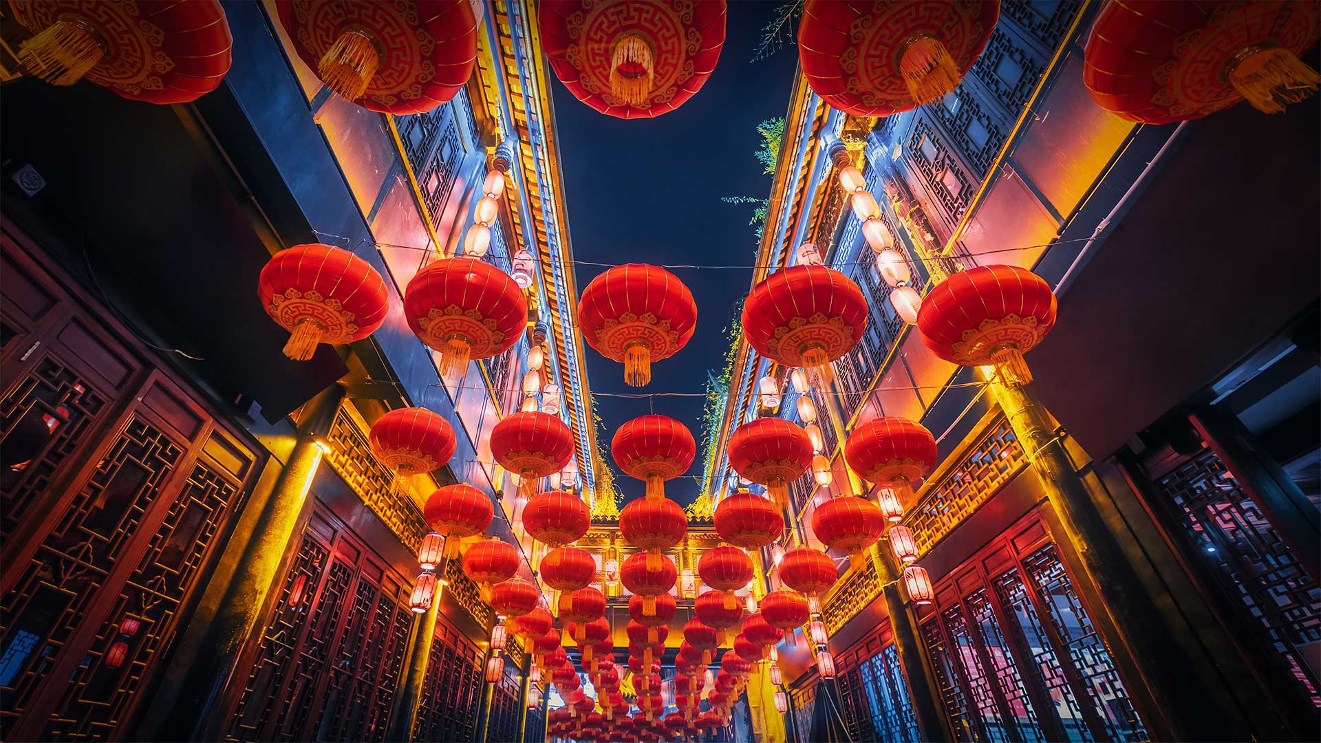 Red lanterns hanging in Jinli Street, Chengdu, China - Philippe LEJEANVRE/Getty Images)