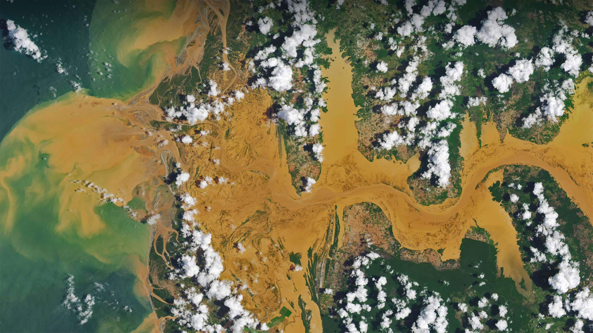 Satellite image of the Mania River in Madagascar - NASA Earth Observatory image by Joshua Stevens, using Landsat data from the US Geological Survey)