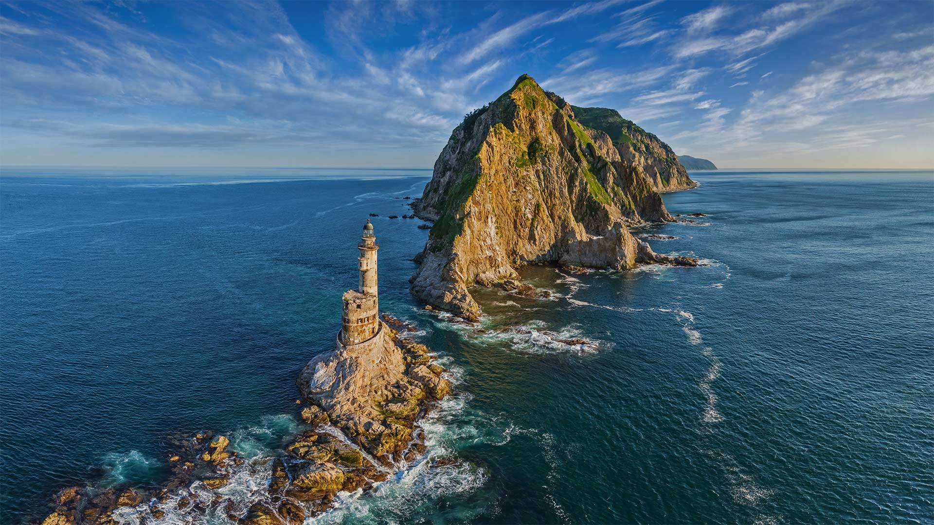 Lighthouse at Cape Aniva, Sakhalin Island, Russia - Amazing Aerial Agency/Offset by Shutterstock)