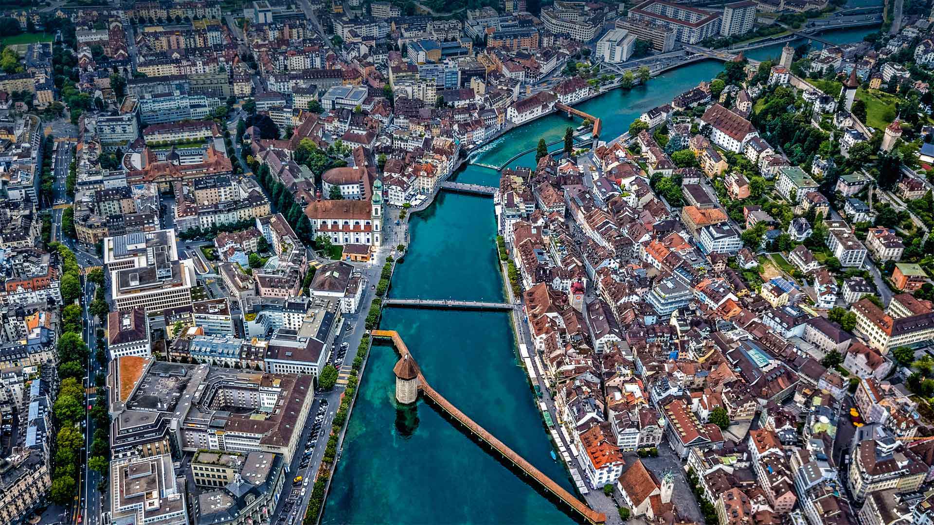 Aerial view of Chapel Bridge over the River Reuss in Lucerne, Switzerland - Neleman Initiative/Gallery Stock)